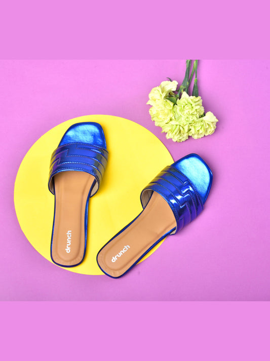 Cosmopolitan Flats Metallic Blue – side view, wide single-strap metallic flats for women
