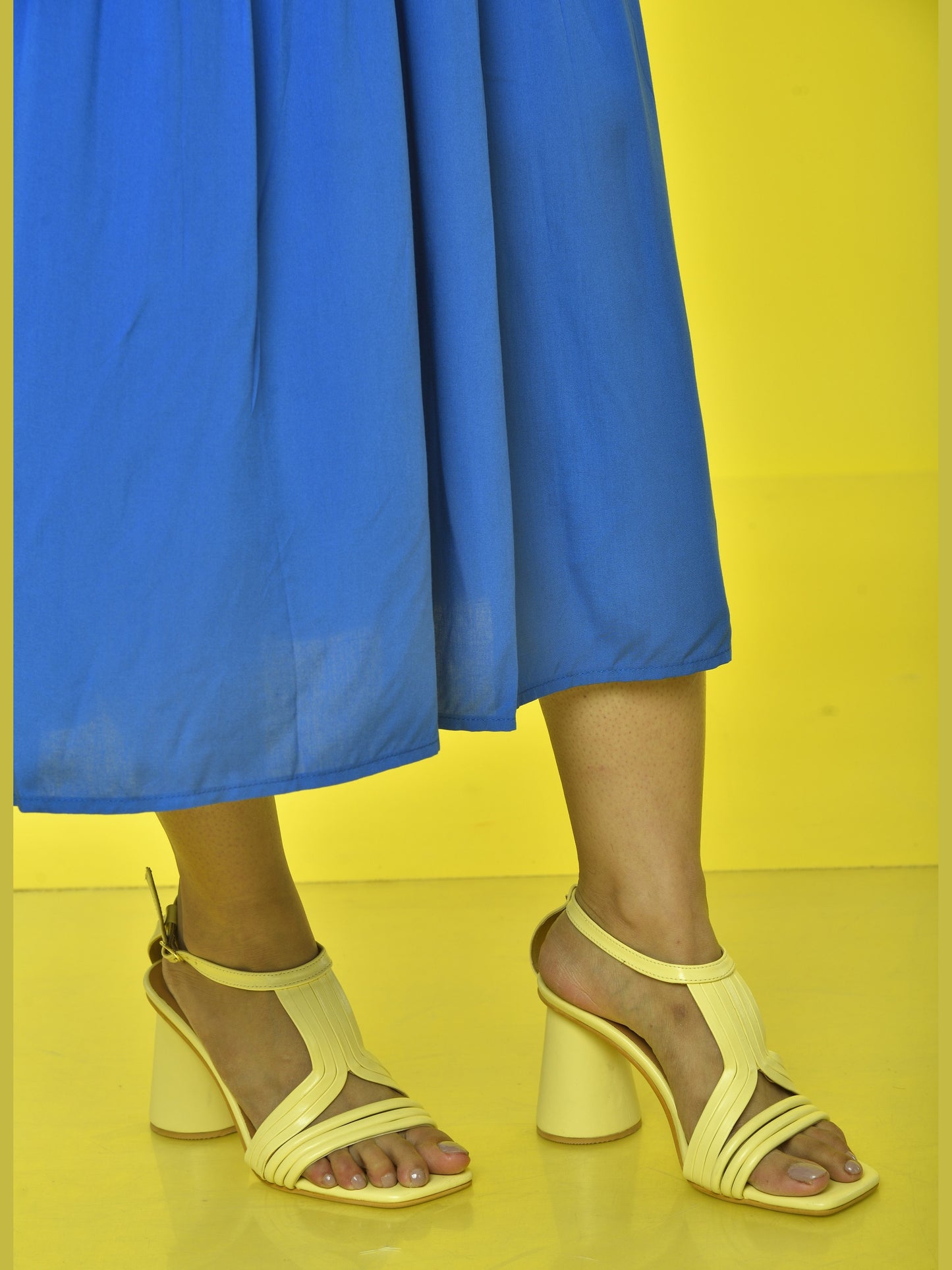 Pina Colada Heels Sunlit Yellow worn by model – women's yellow statement cylindrical heels